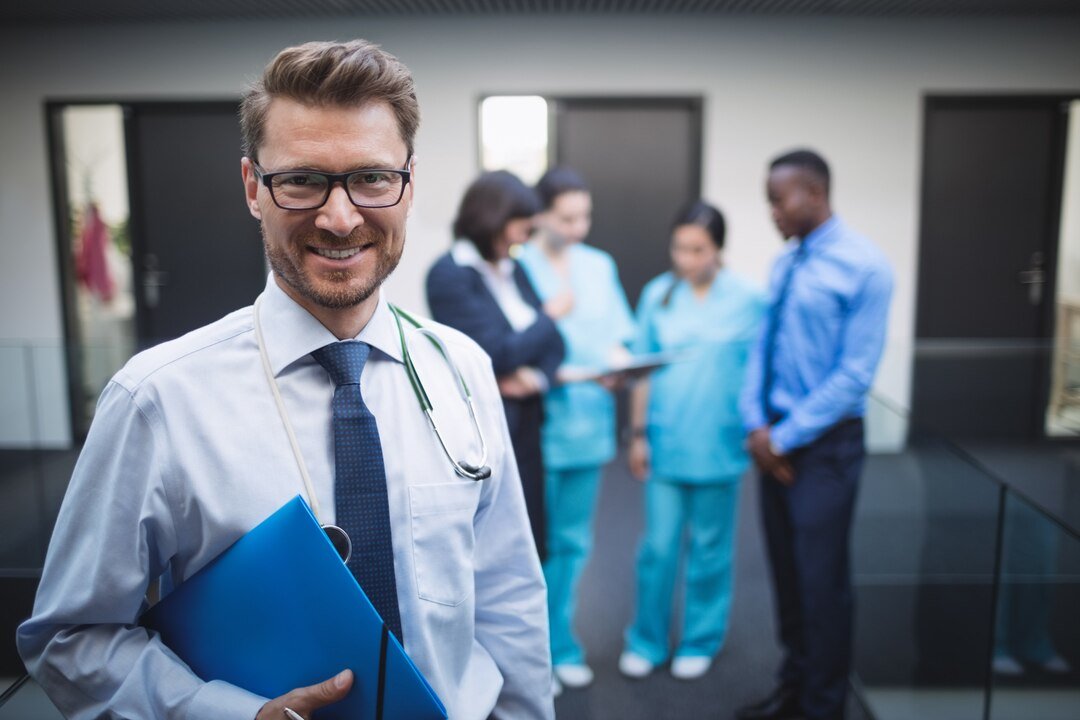 doctor holding medical report